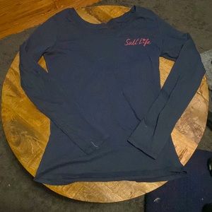 i am selling a blueish grayish colored long sleeve, size medium
